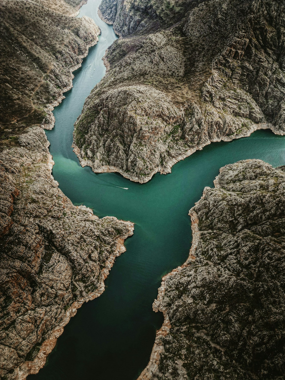 Turquoise river flows through a dramatic, rocky canyon, Ultra